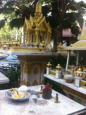 The hotel staff made food offerings by the shrines at the entrance every morning. The hotel cats were not skinny!