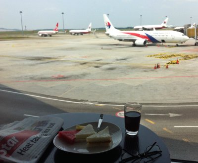 Loungelunch at KLIA. Next stop Kuching. Note the headline in the newspaper...