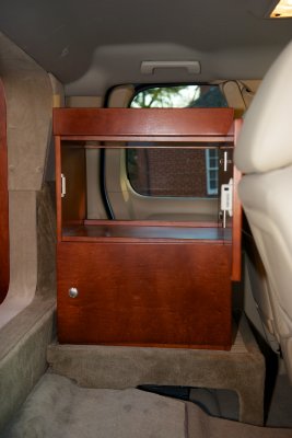 Cabinet behind Driver's Seat