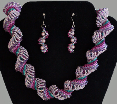 JW WhirlyGig earrings & Jubilation dutch spiral necklace.jpg