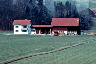 Farmhouse, from a train
