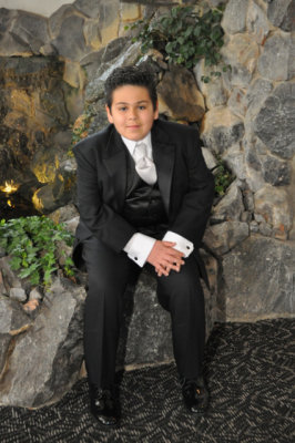 Same kid...he cleans up nice, doesn't he?