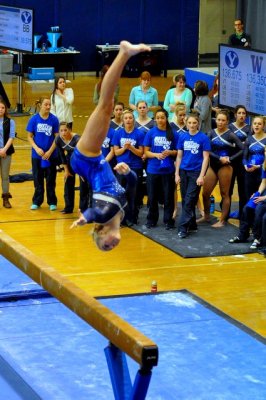 And she landed on that narrow beam!