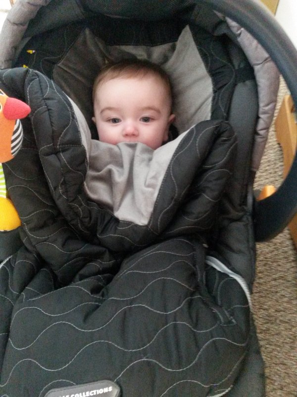 The cold weather doesnt bother Jackie. Thanks for the warm car seat sleeping bag, Aunt Maria! 