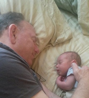 Papa takes up the slack on snoozing with the baby