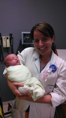 Despite what it looks like, Jack really loves our midwife...