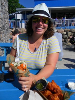 Emily is very sure how she feels about fair food: delicious!  Enjoying chicken in a waffle and blue cheese & corn fritters