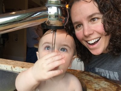 Playing in Baba's sink is pretty great