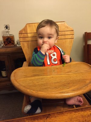Jack fits so well in his high chair!  This chair was also used by his Papa Don back in the day... 