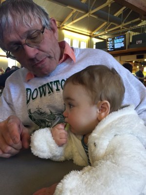 Papa oversees Jack's first pickle experience.  A success all around.