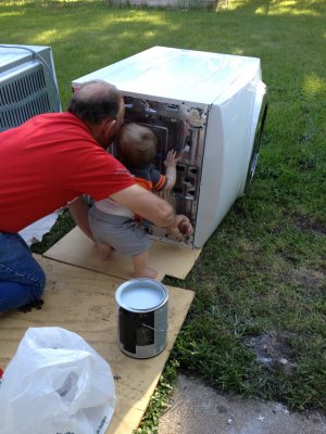 Fixing the dryer with Papa Doyle.