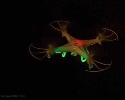 Drone-quad flying at night.