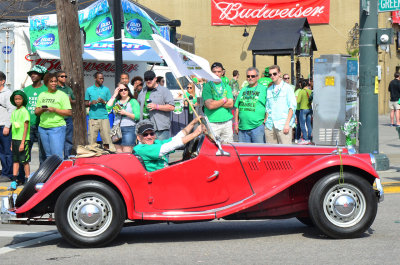 Enjoying the parade in a classic 1955 MG