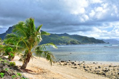 One of the few non black-sand beaches on American Samoa