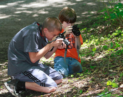 Tyler with Stevo Bowling photographing a Pygmy Rattlesnake