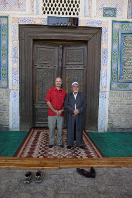 Bukhara, the caretaker and me at the Bolo-Hauz Mosque