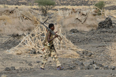 Camp Dodem, one element of our military escort with a heavy machine gun