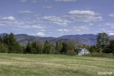 Farmhouse and Adirondacks