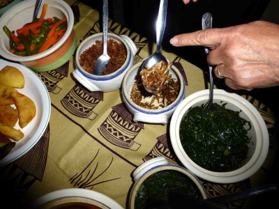 Dishes include Potatoes, Chicken, Dried Fish, Fried Mopane Worms, Kale, Vegetables
