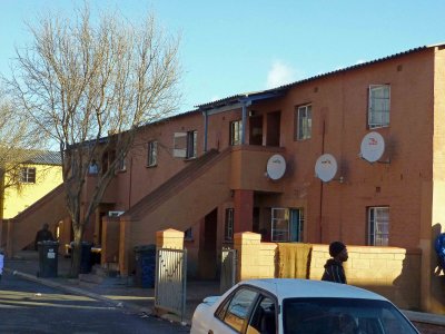 Satellite Dishes on Renovated Hostel in Langa Township