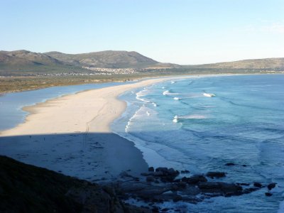 Noordhoek Beach Provides Good Waves for Surfing at High Tide