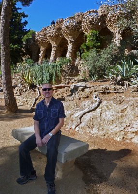 Bill in front of Colonnaded Footpath at Parc Guell