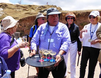 Preparing for a Toast Overlooking 'Sacsayhuaman'