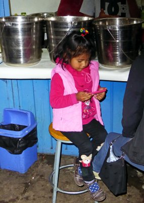 Modern Technology at a Traditional Market in Cusco, Peru
