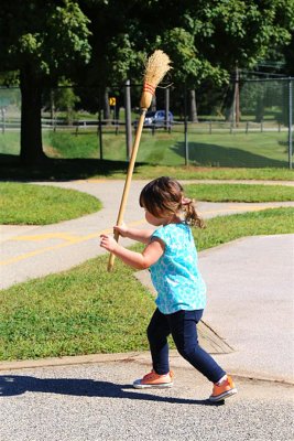 Wielding the broom.