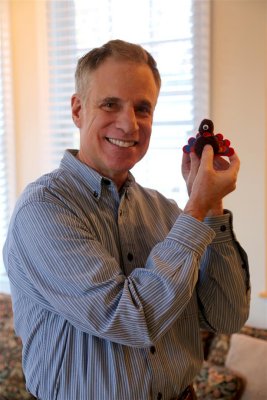 Ken shows off his Thanksgivng gift from Amelia