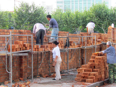 Demolish/Rebuild, first comes the perimeter wall - Shanghai, 2012