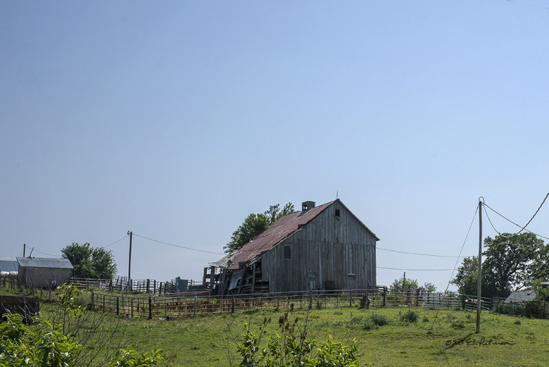 Always hard to see these old buildings falling down little by little. They were such a valuable structure for the farmers of old.
An image may be purchased at http://edward-peterson.artistwebsites.com/featured/the-family-barn-edward-peterson.html