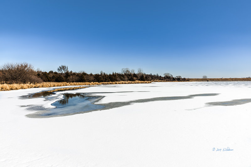 The ice is starting to disappear and some days are warmer than others so spring must be on the way. 
An image may be purchased at http://edward-peterson.artistwebsites.com/featured/spring-is-a-coming-edward-peterson.html