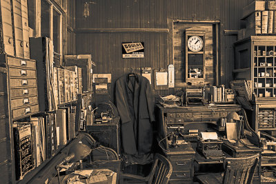 No amount of work can be done without the follow-up paper. A close look you will see a telephone, typewriter, mimeograph and files going back to the beginning of their history. The letter in the typewriter is only half finished.
An image may be purchased at http://fineartamerica.com/featured/paper-work-edward-peterson.html