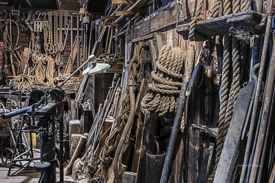 Block and tackles aren't much good without a lot of rope. Windmills weren't short so there is a lot of rope hanging on the walls. Notice in the upper right corner a seat or platform to work from up in the air.
An image may be purchased at http://edward-peterson.artistwebsites.com/featured/ropes-edward-peterson.html