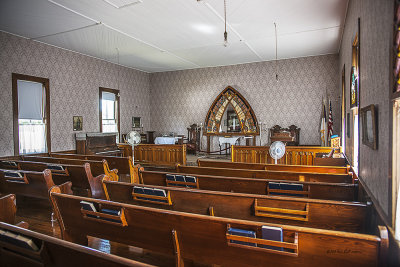 With the exception of the fans and electric lights this has to be close to how the church looked when it was first built. Spaulding Methodist Episcopal Church in Creston, IA is a super job of preservation.
An image may be purchased at http://edward-peterson.artistwebsites.com/featured/inside-the-church-edward-peterson.html