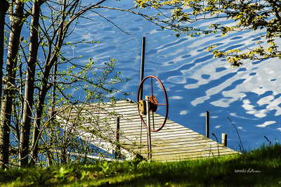 An early spring day and the dock is just waiting for the boat to return with all it passengers to begin the party,
An image may be purchased at http://edward-peterson.artistwebsites.com/featured/waiting-for-the-return-edward-peterson.html