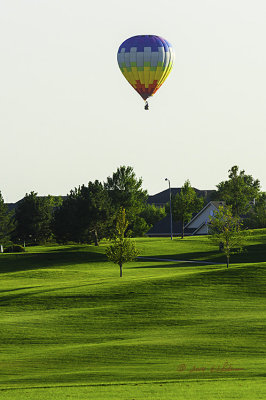 A very pretty site as the balloon floats along a golf course. Hope to see more of this as fall is coming.
An image may be purchased at http://edward-peterson.artistwebsites.com/featured/hot-air-balloon-and-golf-edward-peterson.html