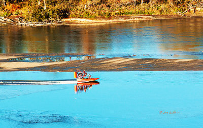 Trying to catch the autumn color along the Platte River and spotted another person out taking advantage of a great fall day. 
An image may be purchased at http://edward-peterson.artistwebsites.com/featured/air-boat-on-the-platte-edward-peterson.html