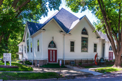 

This United Methodist Church is located just off the main street on a nice shady lot. It gives the people leaving the service a great opportunity to chat with their neighbors to find out if Sally had given birth yet or how the new team of horses are doing for Tom.

An image may be purchased at http://edward-peterson.artistwebsites.com/featured/1-united-methodist-church-edward-peterson.html