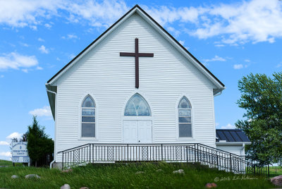 It may not be a ancient cathedral, but the Oakland Sharon Presbyterian Church in SW Iowa has been serving the local community for years. These country churches are a key element of life and a source of pride for the rural folks.

An image may be purchased at http://edward-peterson.pixels.com/featured/oakland-sharon-presbyterian-church-iowa-edward-peterson.html?newartwork=true