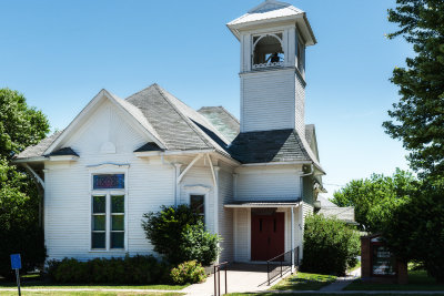 You can drive the county roads and find the small country churches. Turn into a town and you will also find you will find at least one church but more often than not multiple churches. Here in Lewis Iowa is another fine example of the rural church in the small Iowa town. Look close and it appears the bell is still active.

An image may be purchased at http://edward-peterson.pixels.com/featured/lewis-iowa-church-edward-peterson.html?newartwork=true