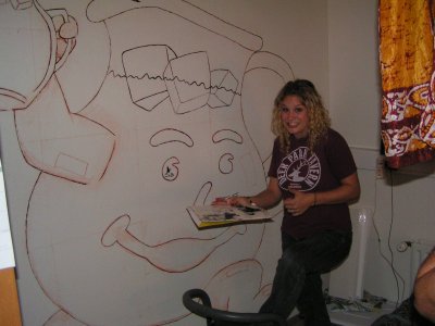 Here is Liz again, painting the wall in her room.  Im glad to see that she has the balls to do something like this.  Plus, it is just fun to walk into her room and see it.  Way to go Liz!