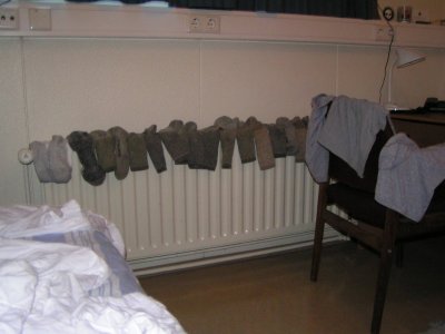 This is what my room looks like on laundry day.  Gamli Gardur only has one dryer, and it is a hunk of shit.  I think it is the only dryer in the world that has clothes come out wetter than when they were put in.  It just absolutely does not dry things worth a damn, so I would rather save the 50 kronur (about 70 cents, U.S.) for two weeks, and I will then have enough for a Coke.  :-)