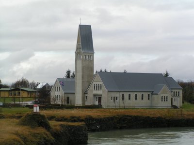 A church in Selfoss.
I got this picture as we were crossing the bridge over the river in the next picture.