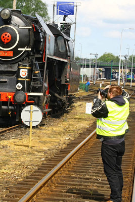 Photographer making a photo of a Locomotive