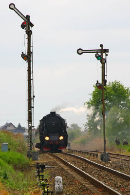 Locomotive is coming into a station