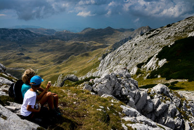 Alex and Aneta, lunch break above Ilin Do pass 2230m, Todorov Do 1820m below, Durmitor NP
