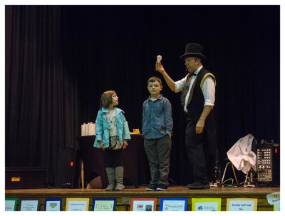 Norah volunteers at the magic show