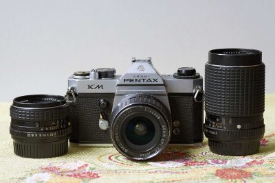 PK mount lenses and KM